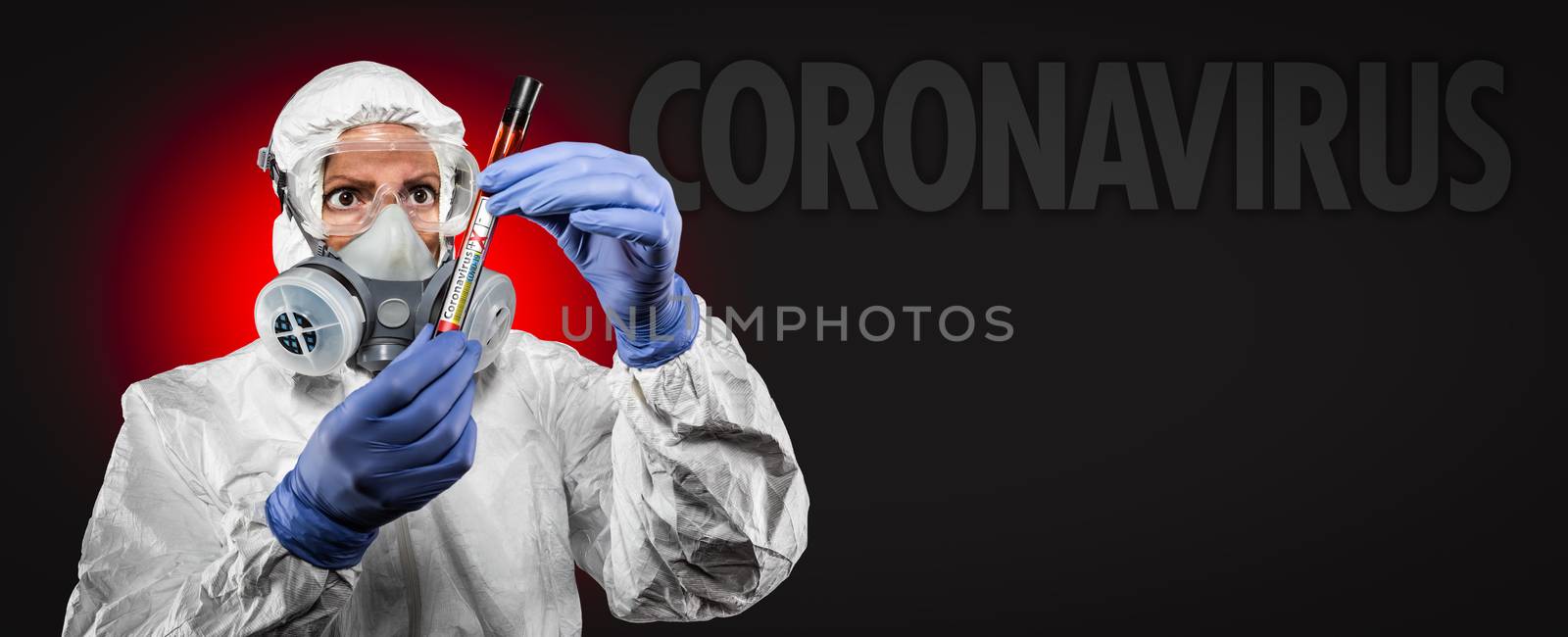 Banner of Female Doctor or Nurse In Medical Protective Gear Holding Positive Coronavirus Test Tube With Coronavirus Text Behind.