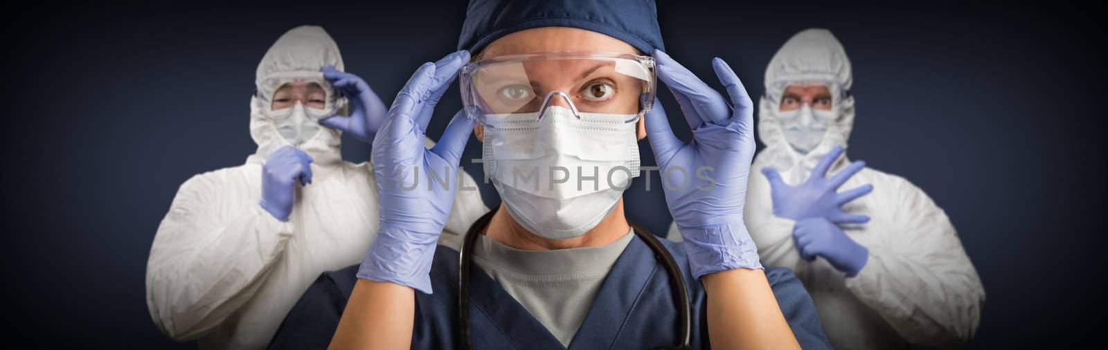 Team of Female and Male Doctors or Nurses Wearing Protective Medical Face Masks and Goggles Banner.