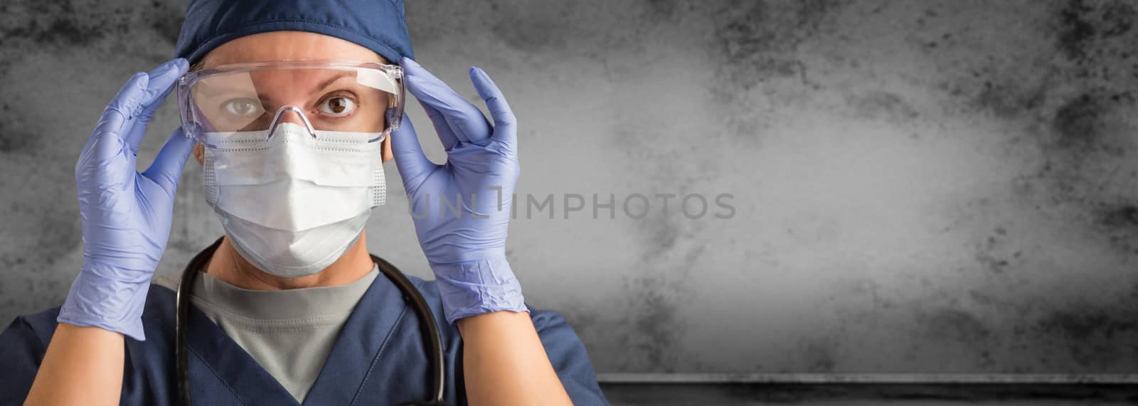 Female Doctor or Nurse Wearing Scrubs and Protective Mask and Goggles Banner.