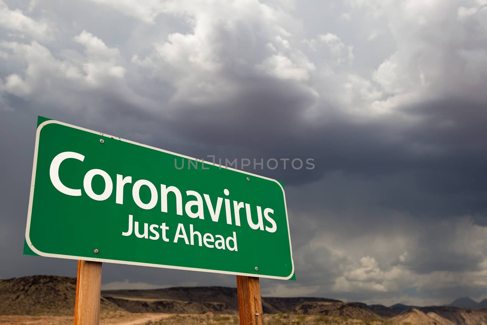 Coronavirus Green Road Sign Against Ominous Stormy Cloudy Sky.