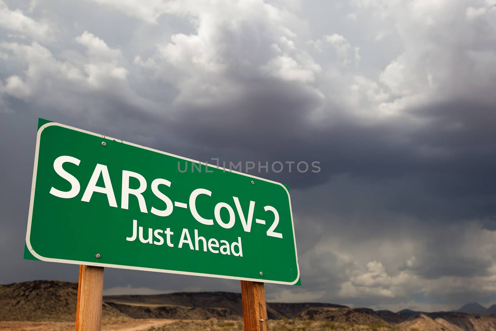 SARS-CoV-2 Coronavirus Green Road Sign Against Ominous Stormy Cloudy Sky. by Feverpitched