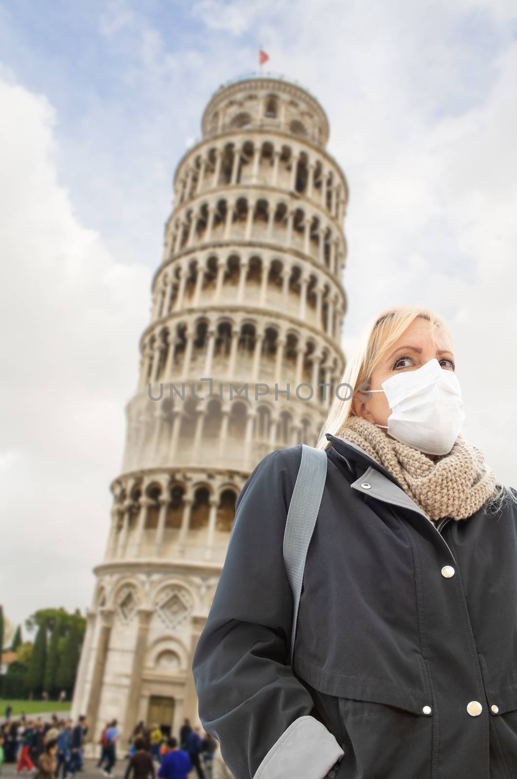 Young Woman Wearing Face Mask Walks Near The Leaning Tower of Pi by Feverpitched