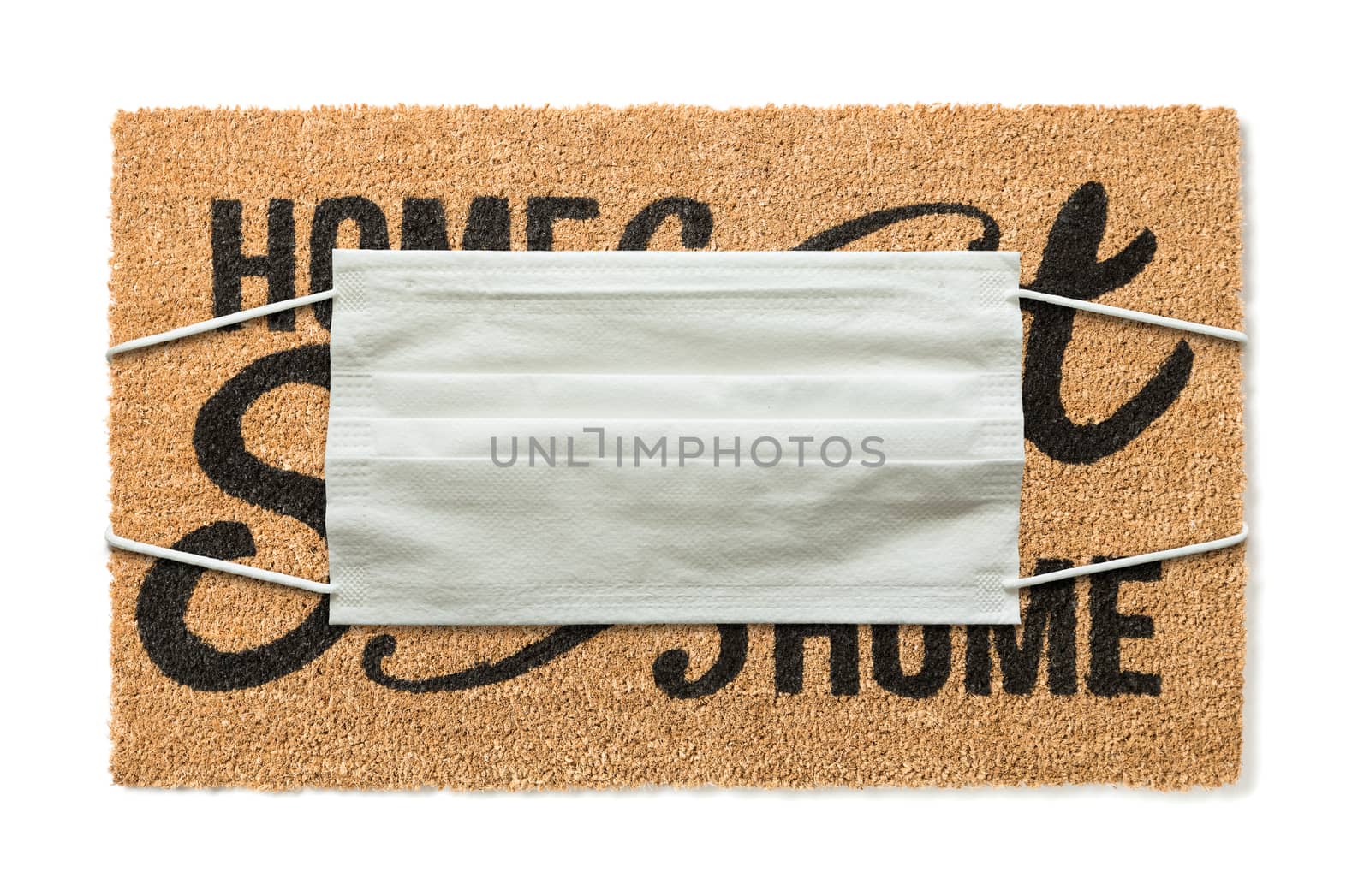 Welcome Mat With Medical Face Mask Amidst The Coronavirus Pandemic Isolated on White.