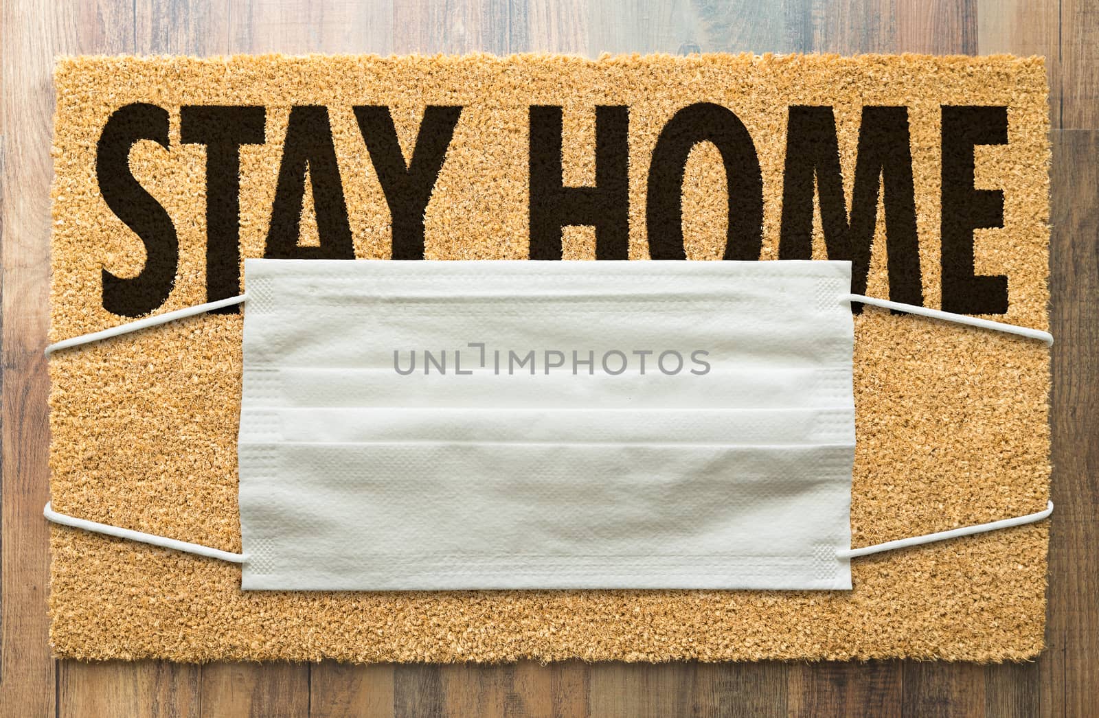 Welcome Mat With Medical Face Mask and Stay Home Text Amidst The by Feverpitched