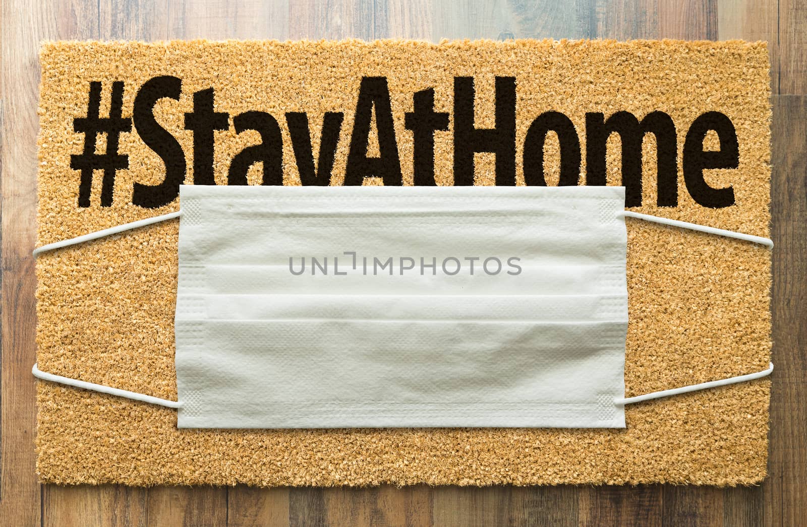 Welcome Mat With Medical Face Mask and #Stay At Home Text Amidst by Feverpitched