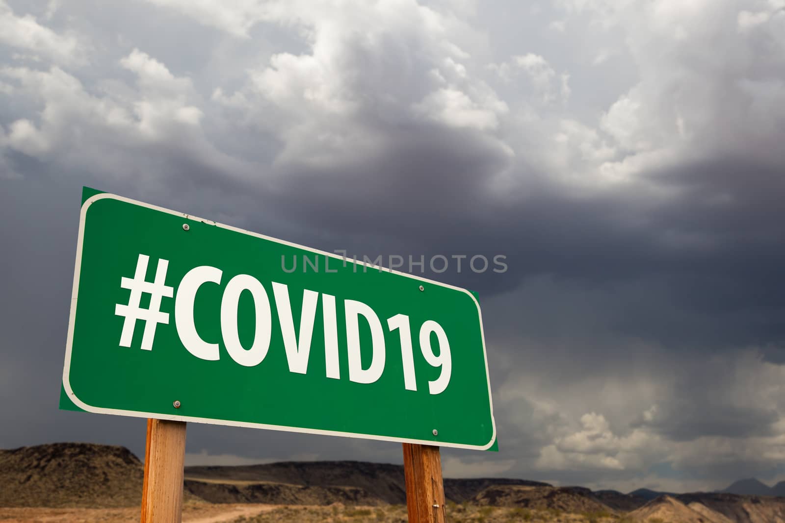 #COVID19 Green Road Sign Against An Ominous Cloudy Sky by Feverpitched