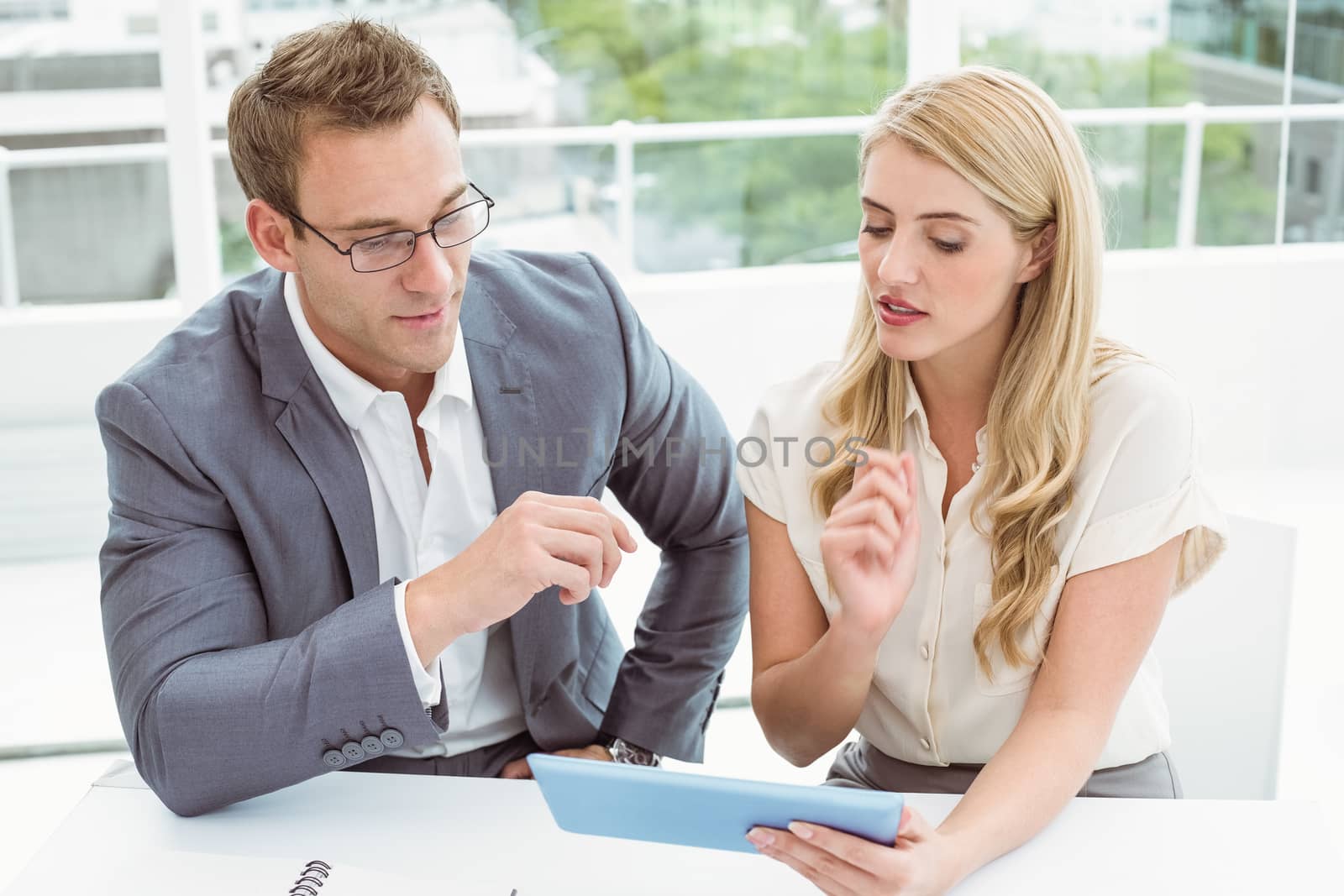 Business people using digital tablet in the office
