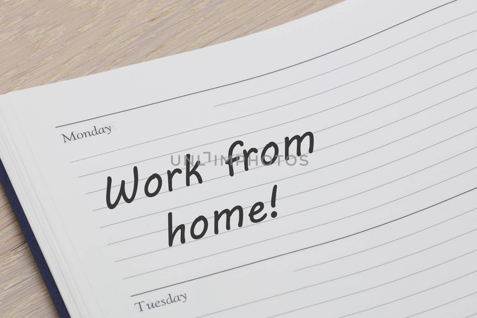 A work from home job diary reminder open on desk