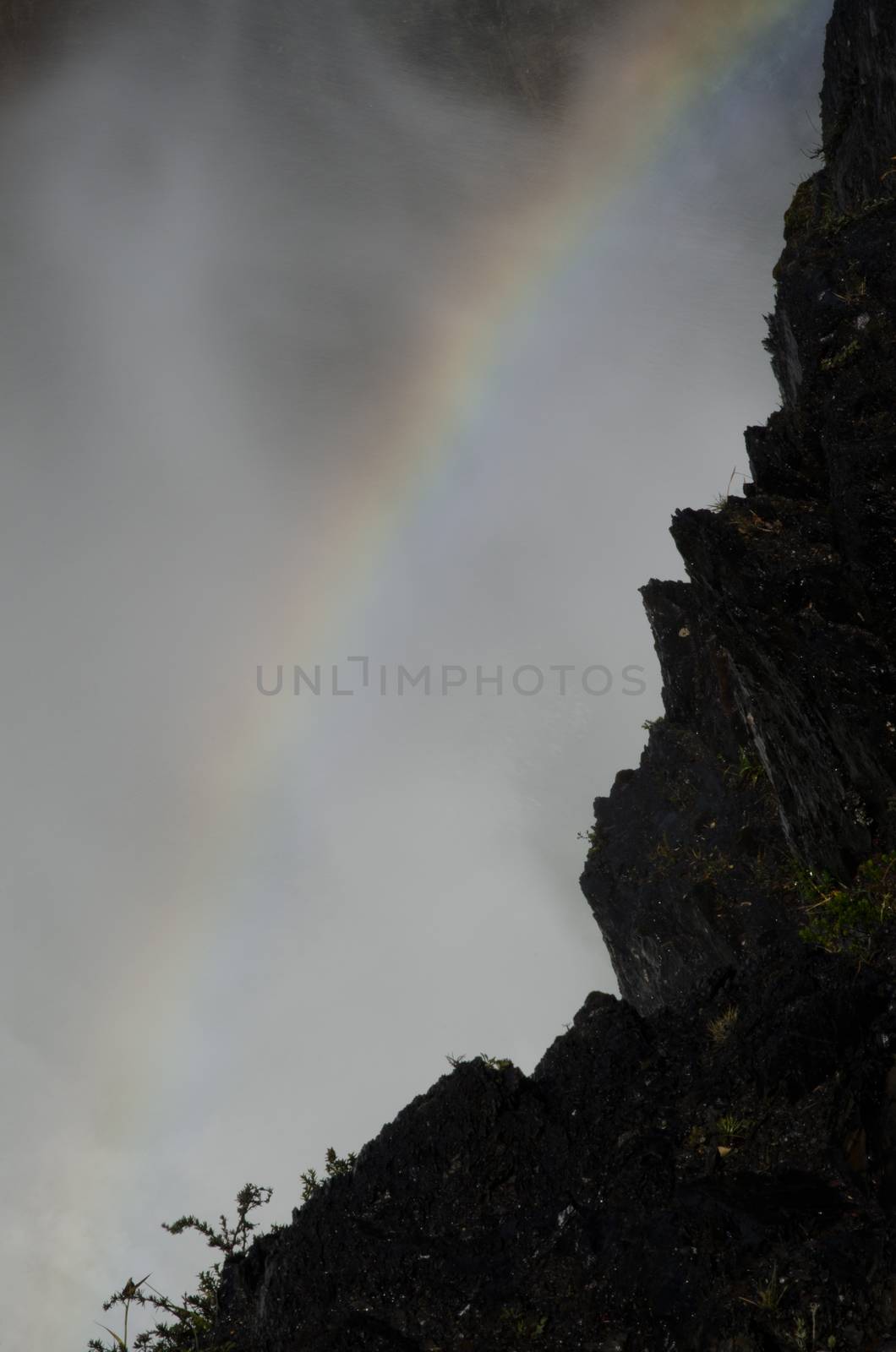 Rainbow over the Salto Grande waterfall. Torres del Paine National Park. Ultima Esperanza Province. Magallanes and Chilean Antarctic Region. Chile.