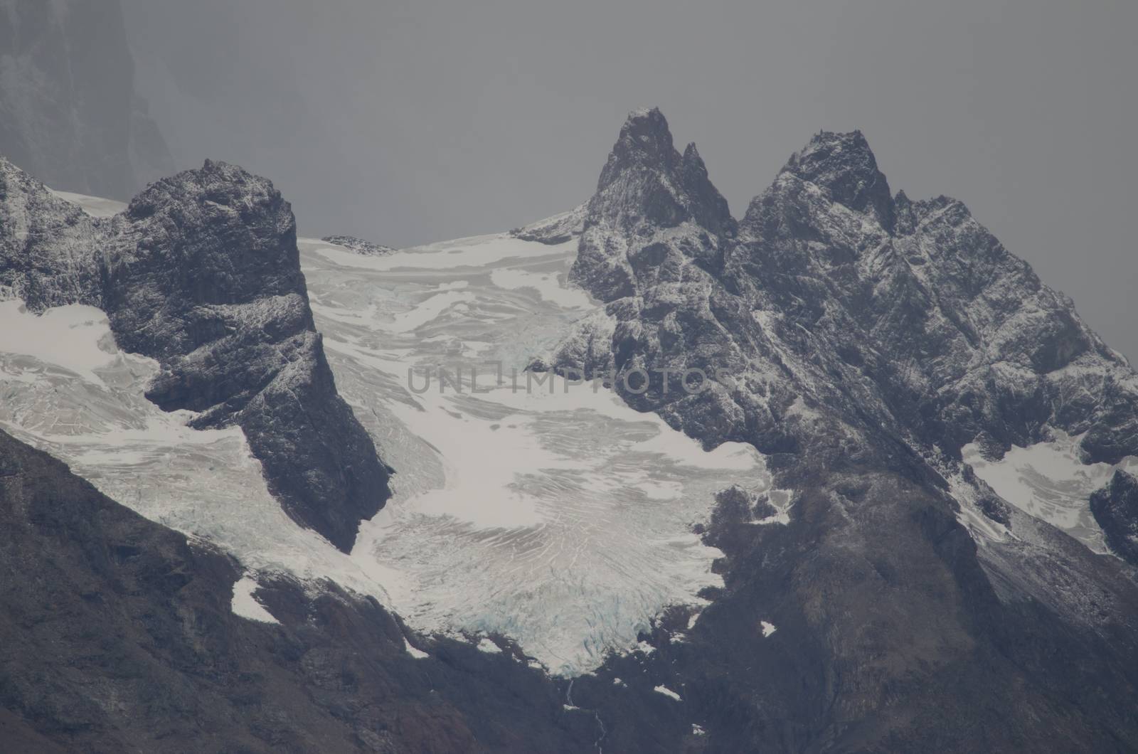 Cliffs and glacier in Torres del Paine National Park. Ultima Esperanza Province. Magallanes and Chilean Antarctic Region. Chile.