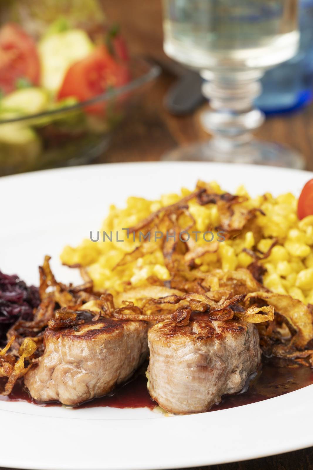 swabian pork fillets with spaetzle on a plate