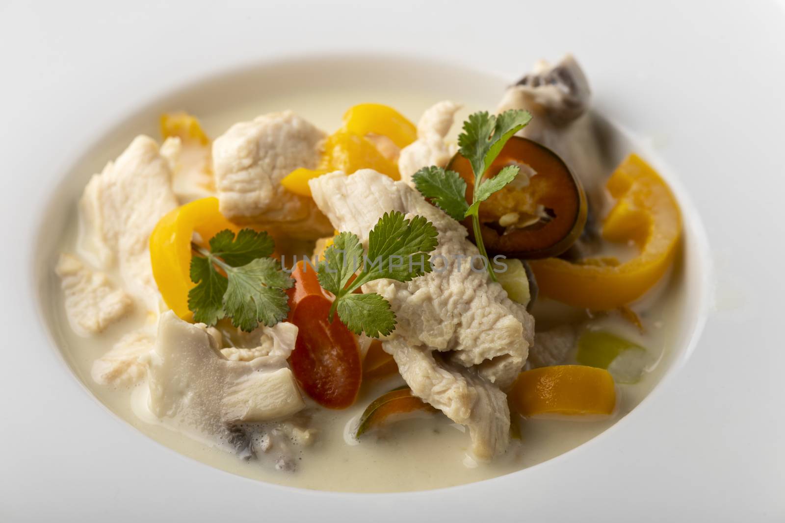 thai tom kha gay soup with lemon