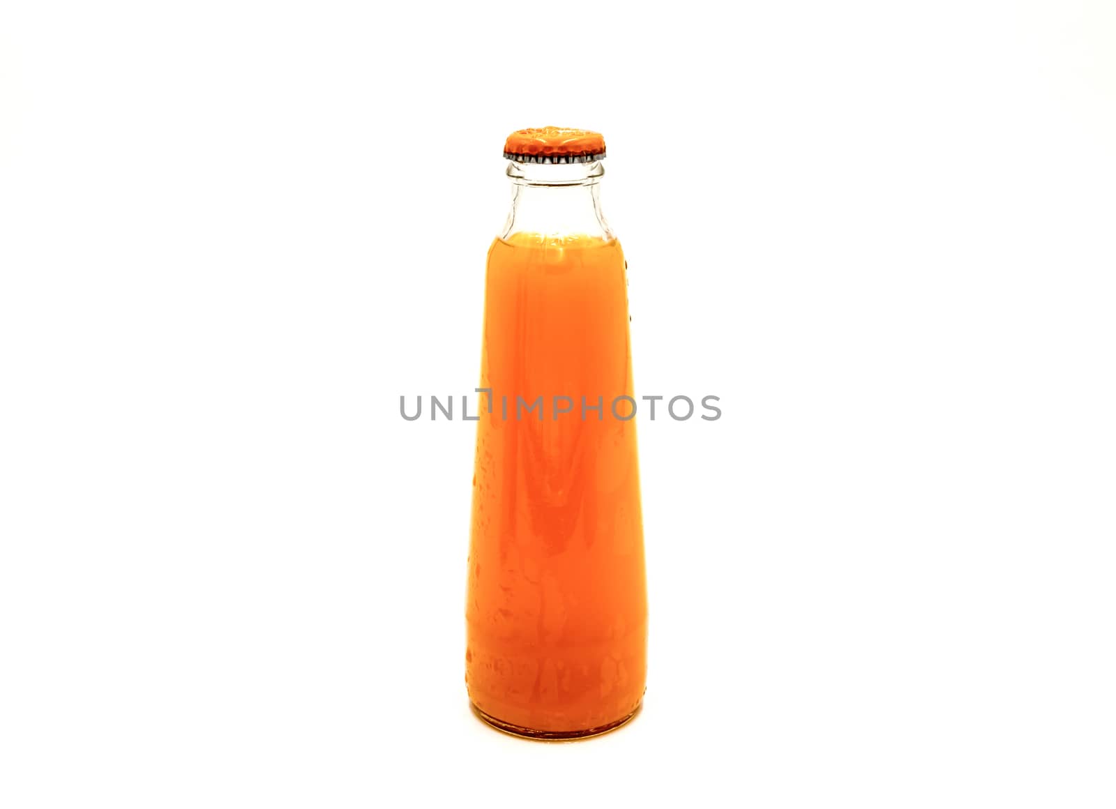 A bottle of tropical exotic multifruit juice isolated on a white background