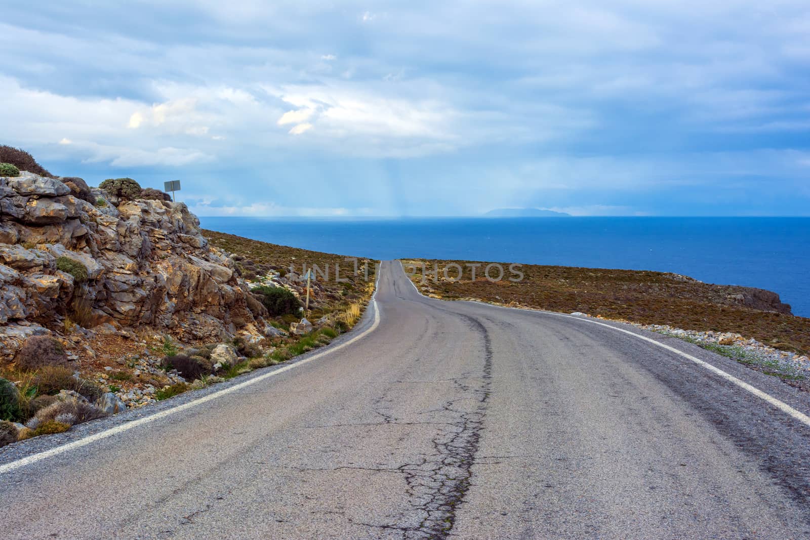 Empty endless mountain road towards Kato Zakros at Crete, Greece