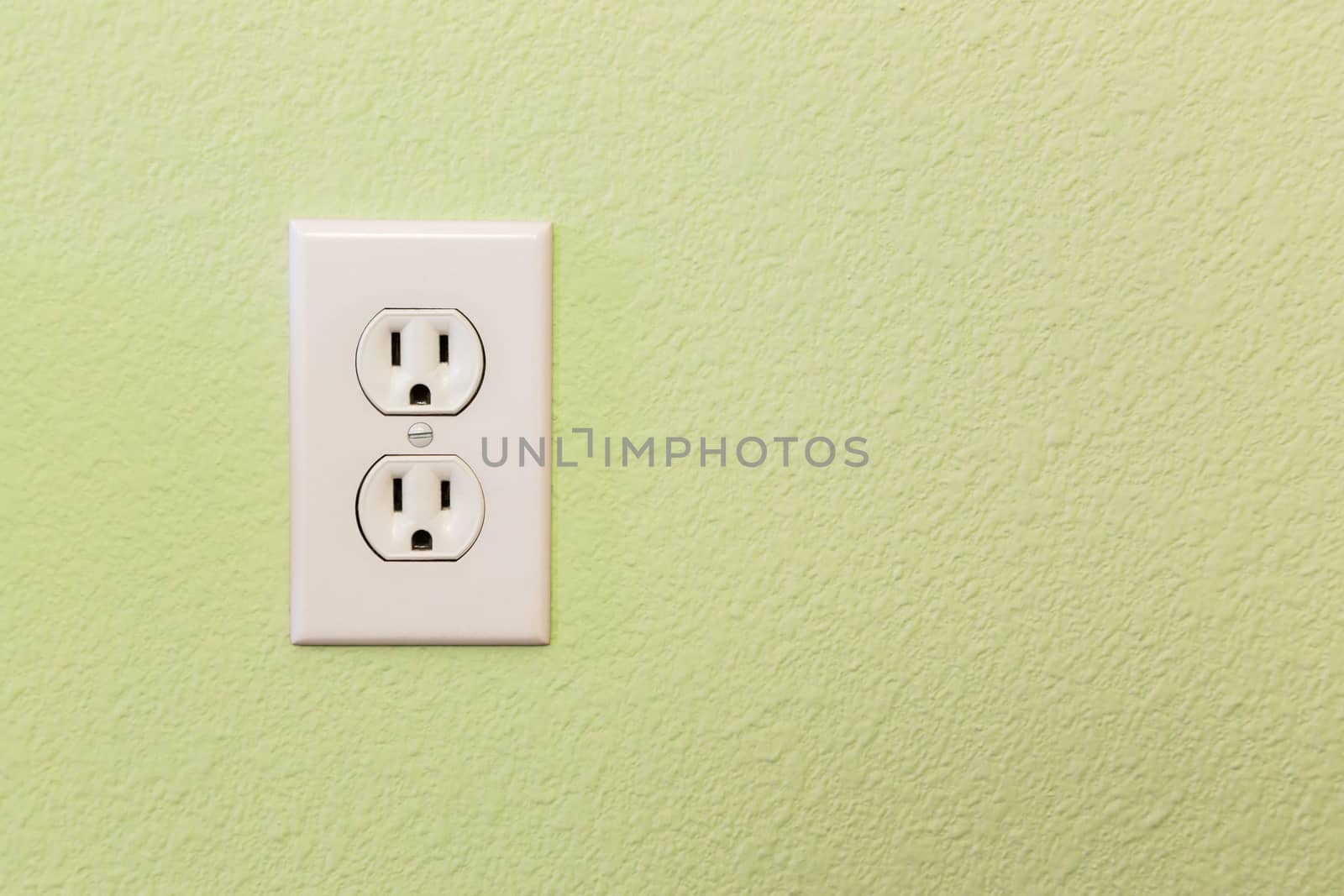 Electrical Sockets In Colorful Wall of House. by Feverpitched
