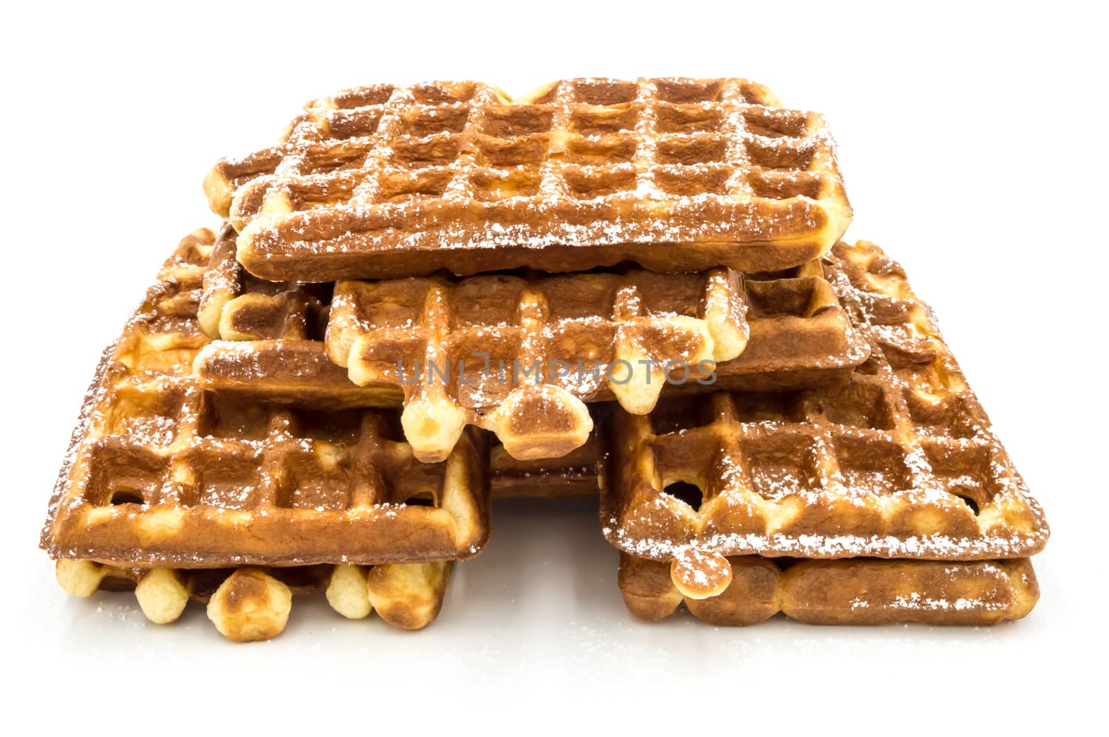 Mound of Belgian waffles on a white background