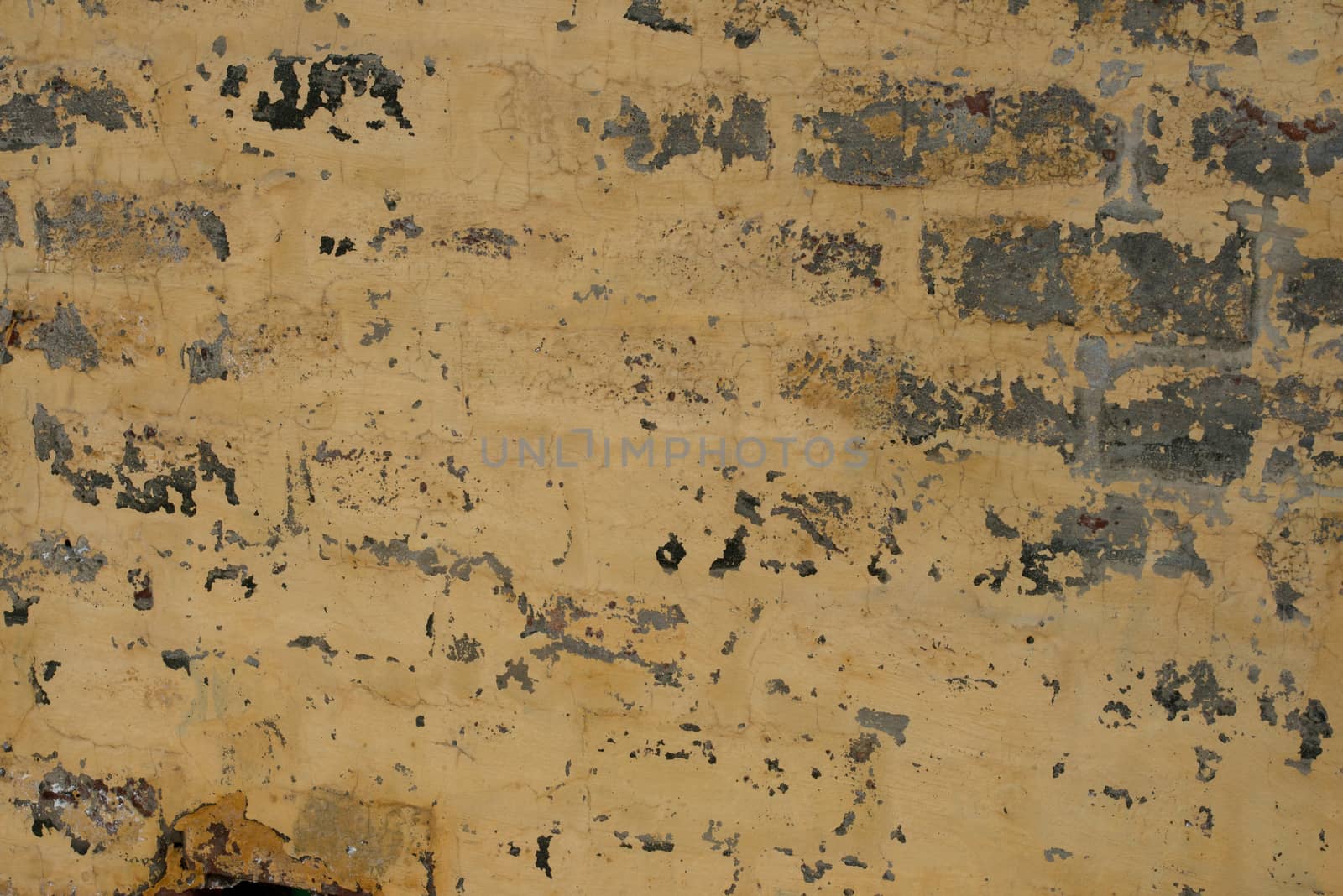 Yellow color Grungy Brick wall texture background