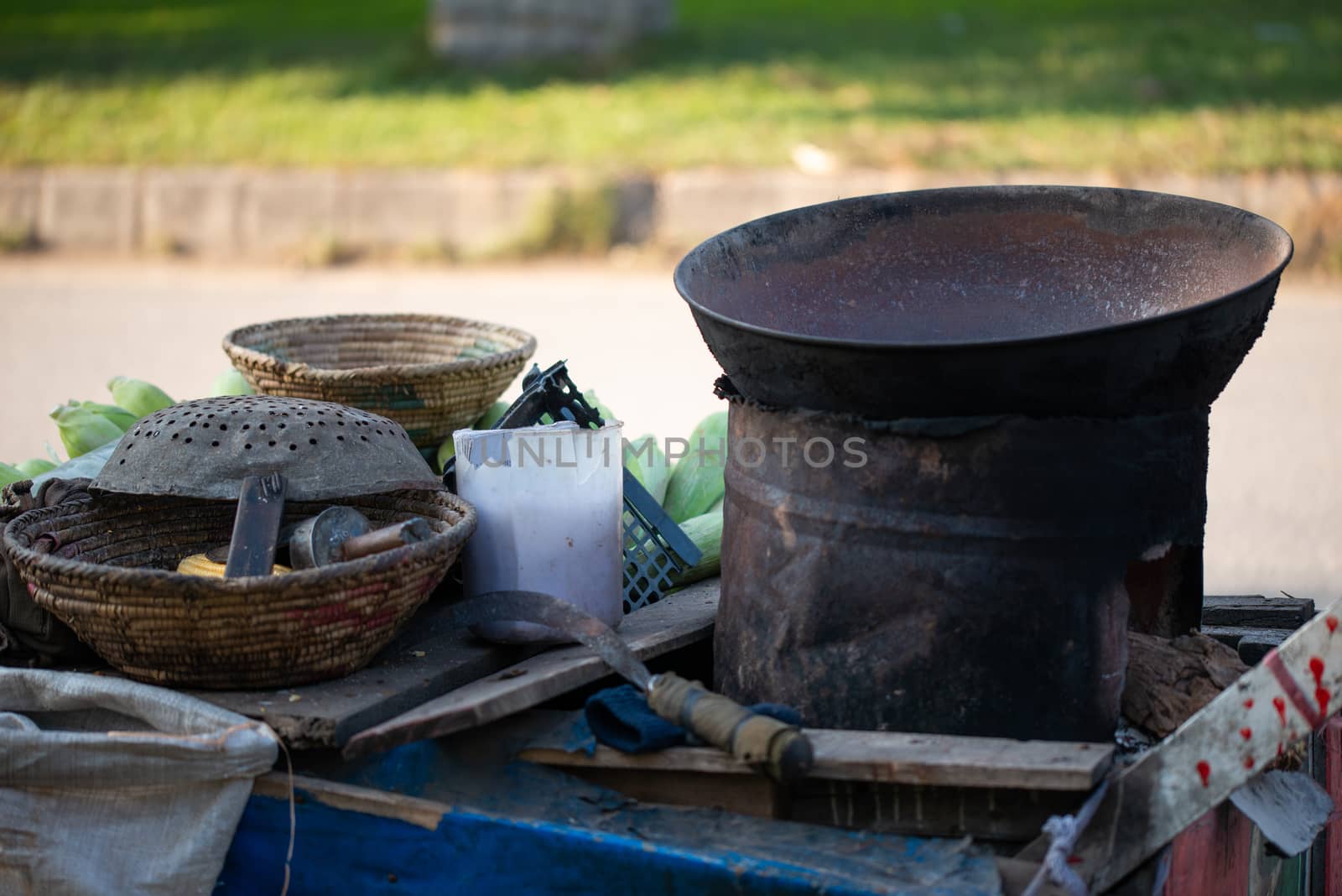 Corn roasting stall on the street by shaadjutt36