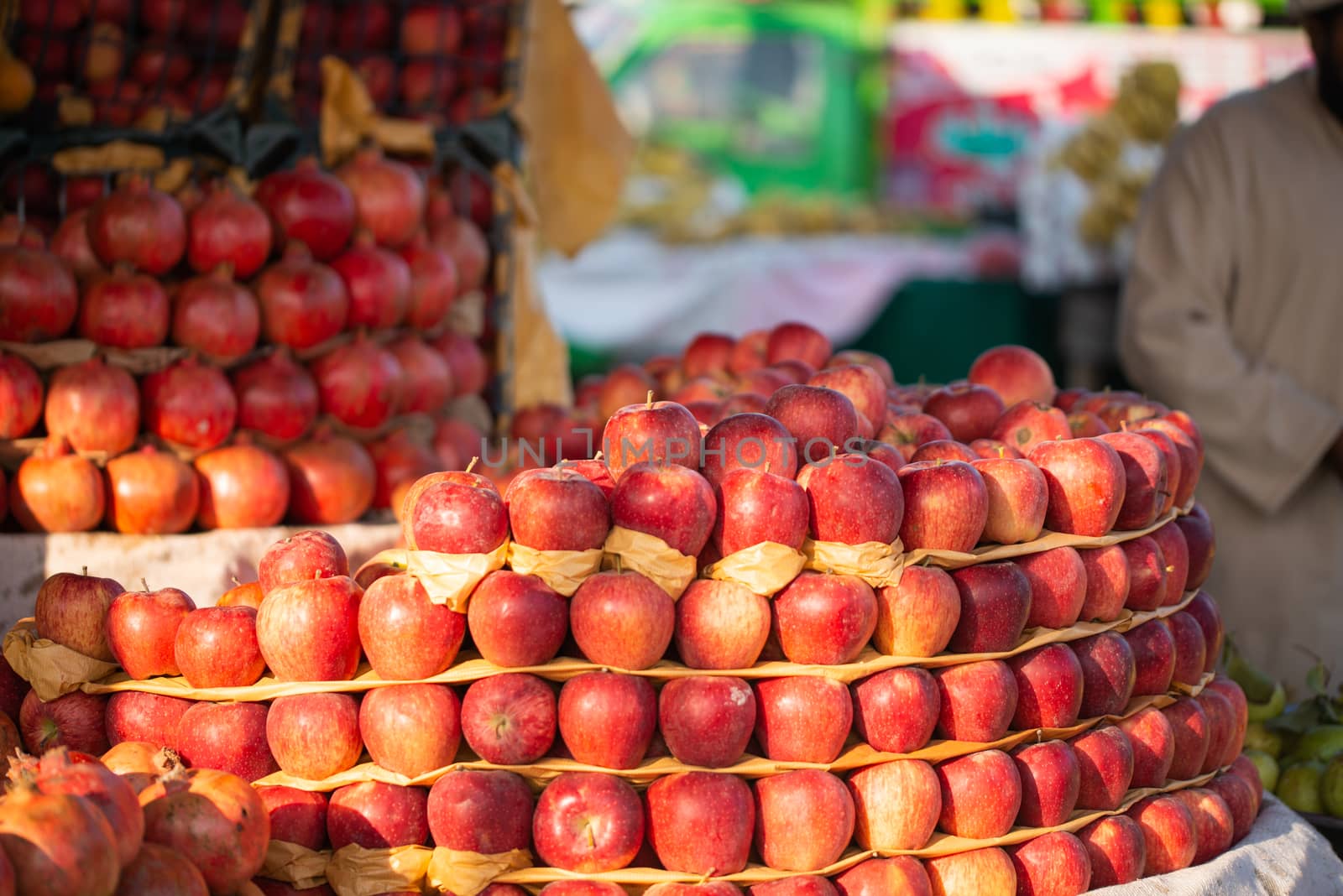 Fresh organic apples are displayed in the market by shaadjutt36