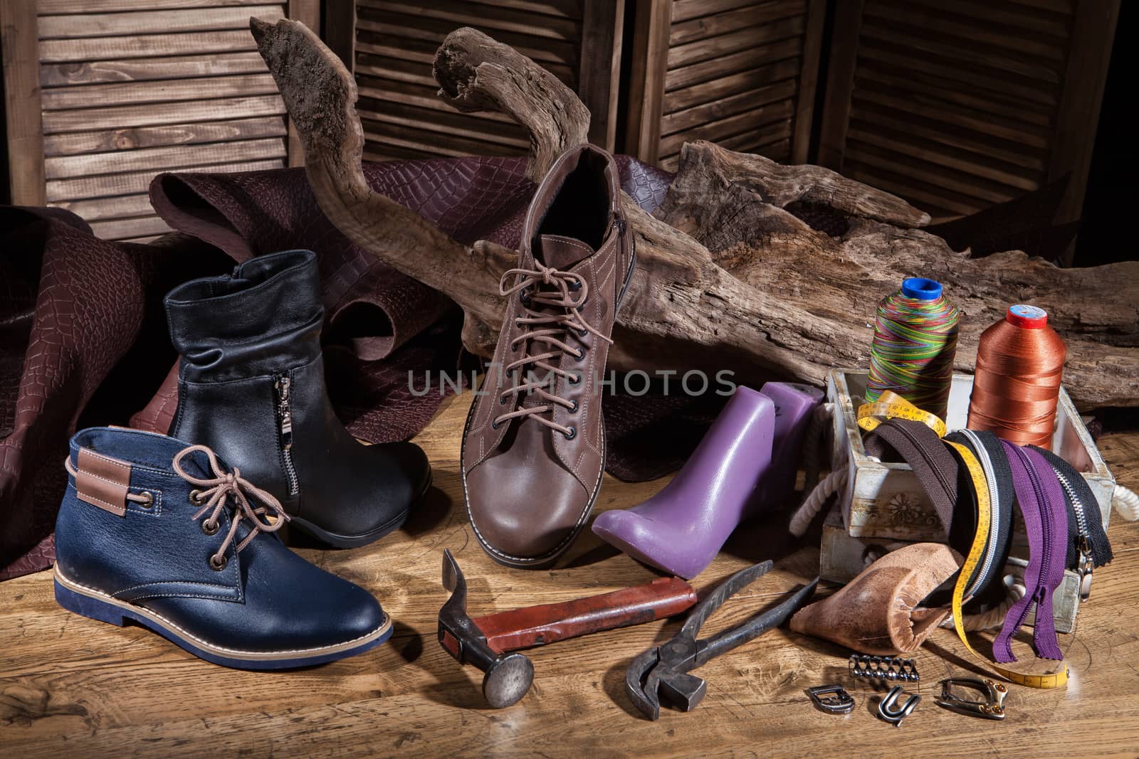 Still life with shoes and different accessories