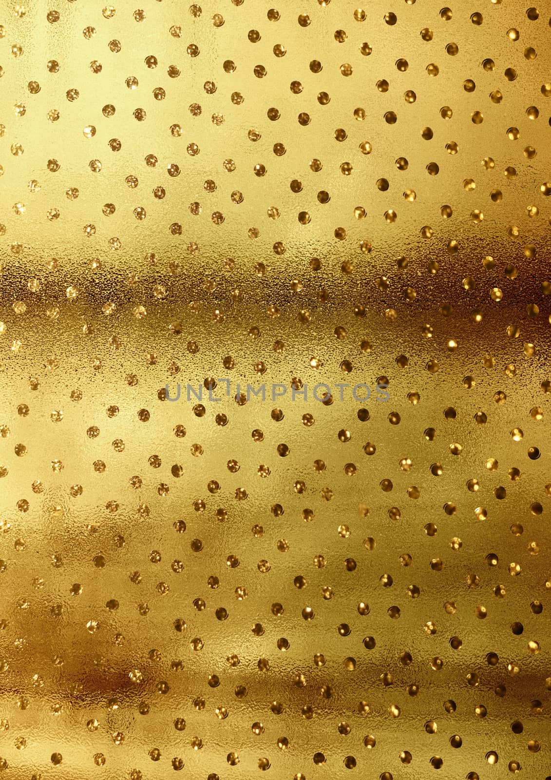 The vertical Crumped golden paper background with glitter pattern