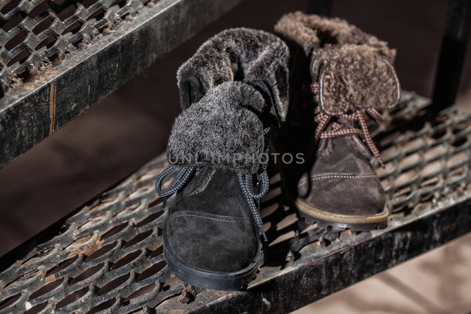 Different kinds of shoes on a natural background