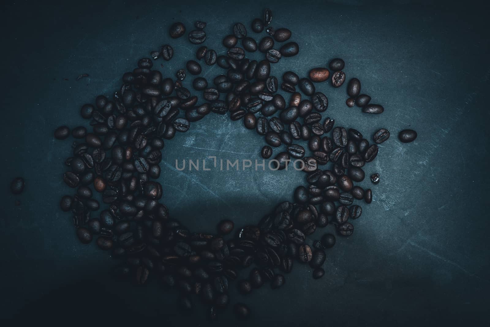 The Top view of coffee beans on dark background, Color retro style, Thailand. Bean, aroma.