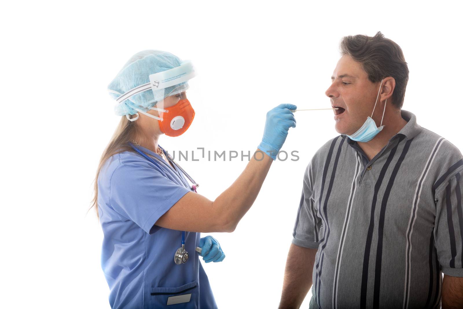 Female healthcare nurse swabs a man for infectious disease such as SARS or COVID-19 or influenza pandemic