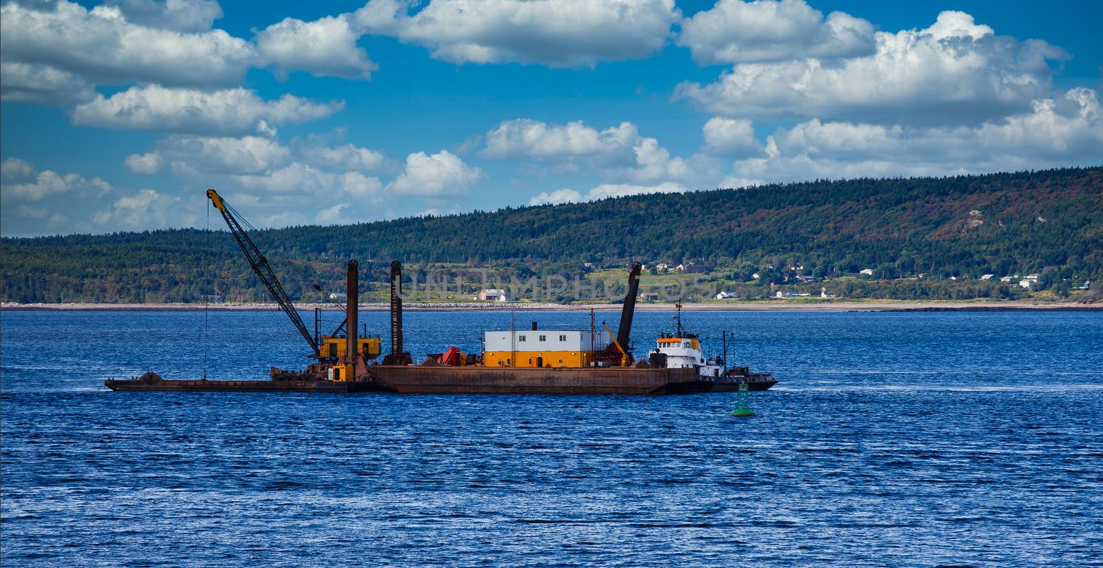 A working barge off the coast of Nova Scotia Canada