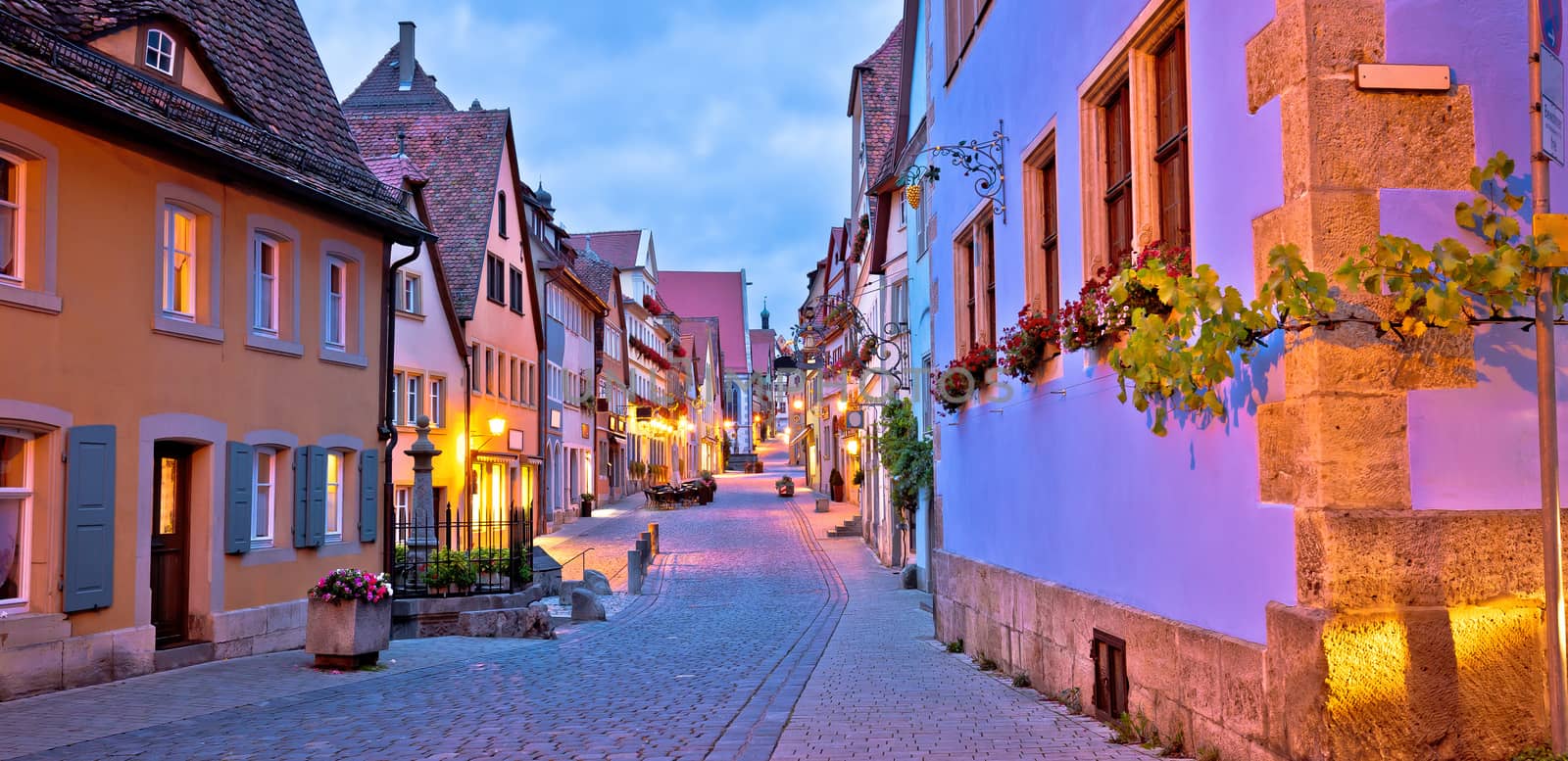 Rothenburg ob der Tauber. German street architecture of medieval German town of Rothenburg ob der Tauber evening panoramic view. Bavaria region of Germany