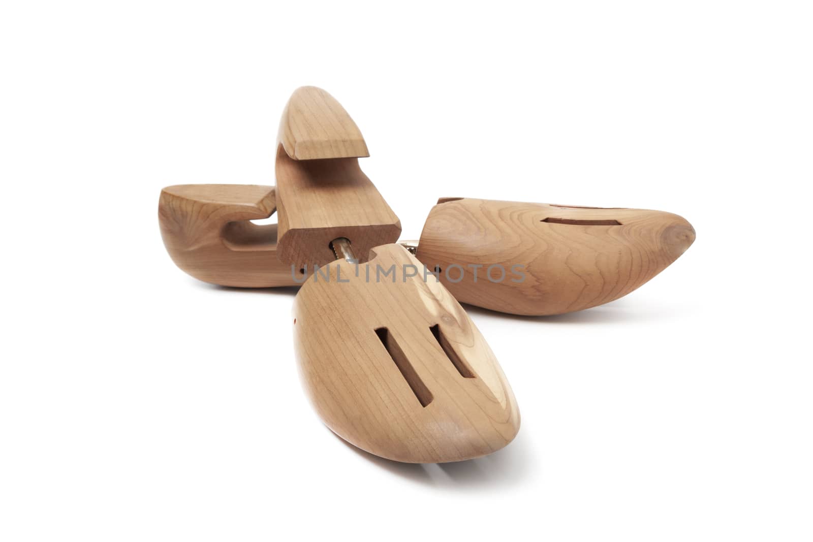 A Shoe tree made from cedar from the Woodlore company isolated on a white background.