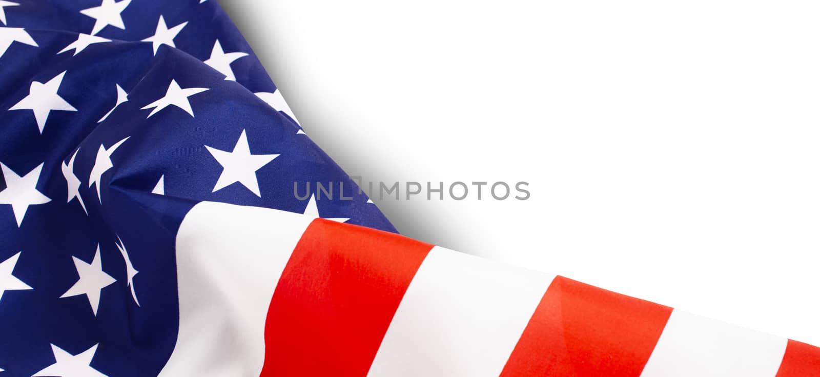 American flag isolated on white background. Top view, copy space for text.