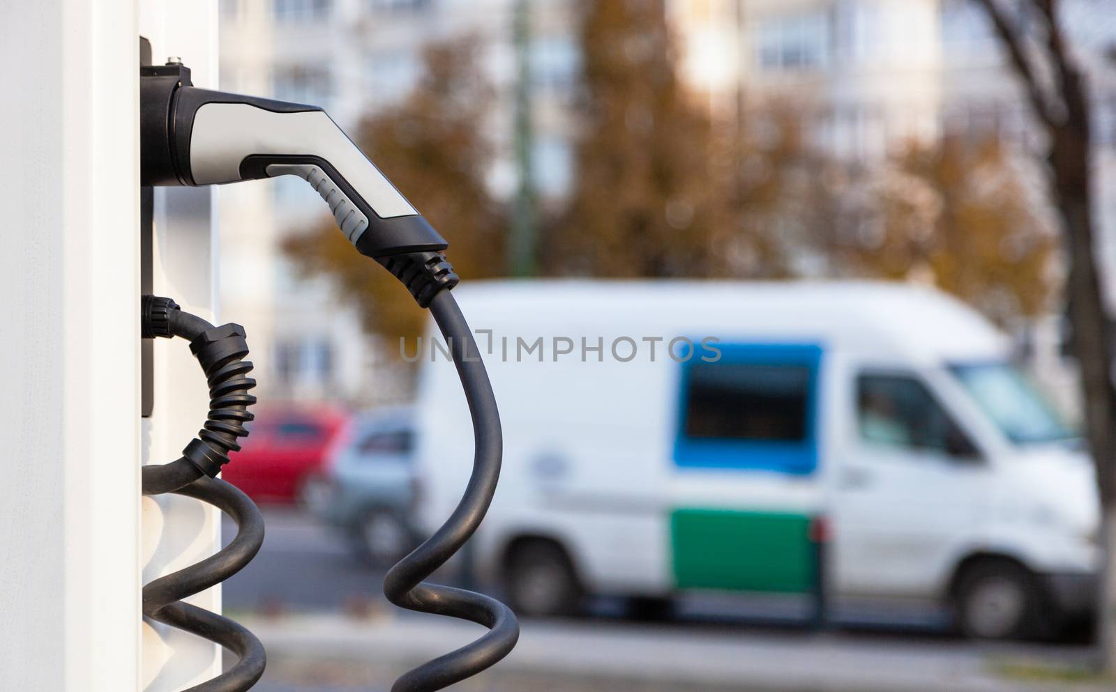 Power supply for electric car charging. Electric car charging station. Blurred concept