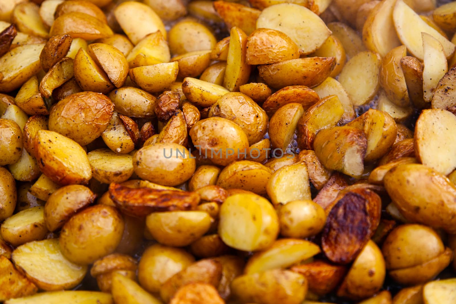 Rustic fried potatoes. Close up background concept