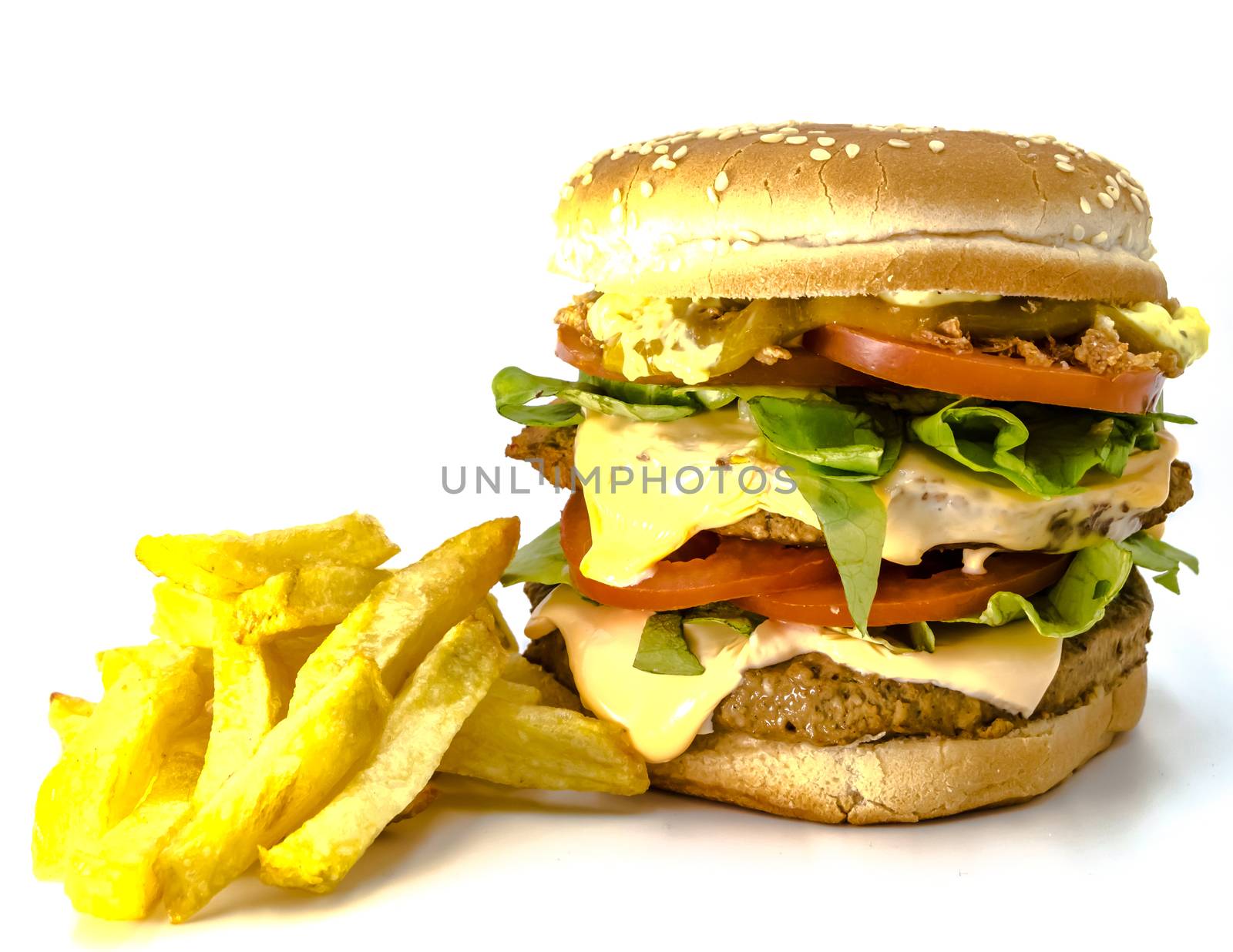 Double meat and cheese burger with fresh fries on a white background