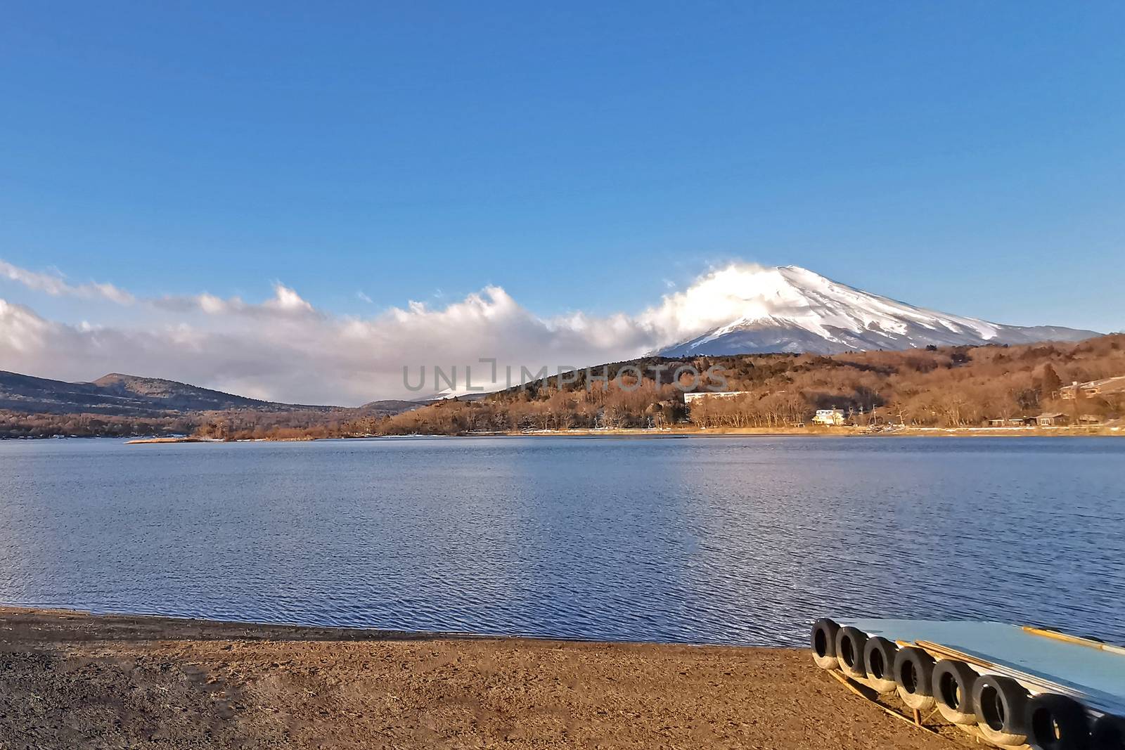 The lake, sky and Fuji mountain with snow in Japan countryside
