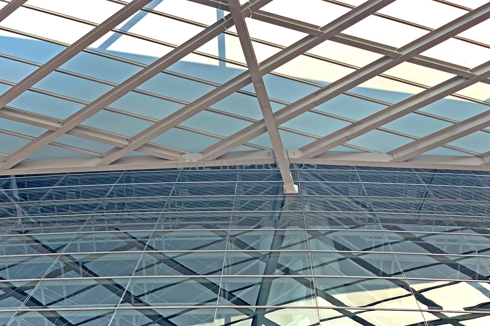 The exterior roof top and exterior glass window of modern exhibition center building in Hong Kong city
