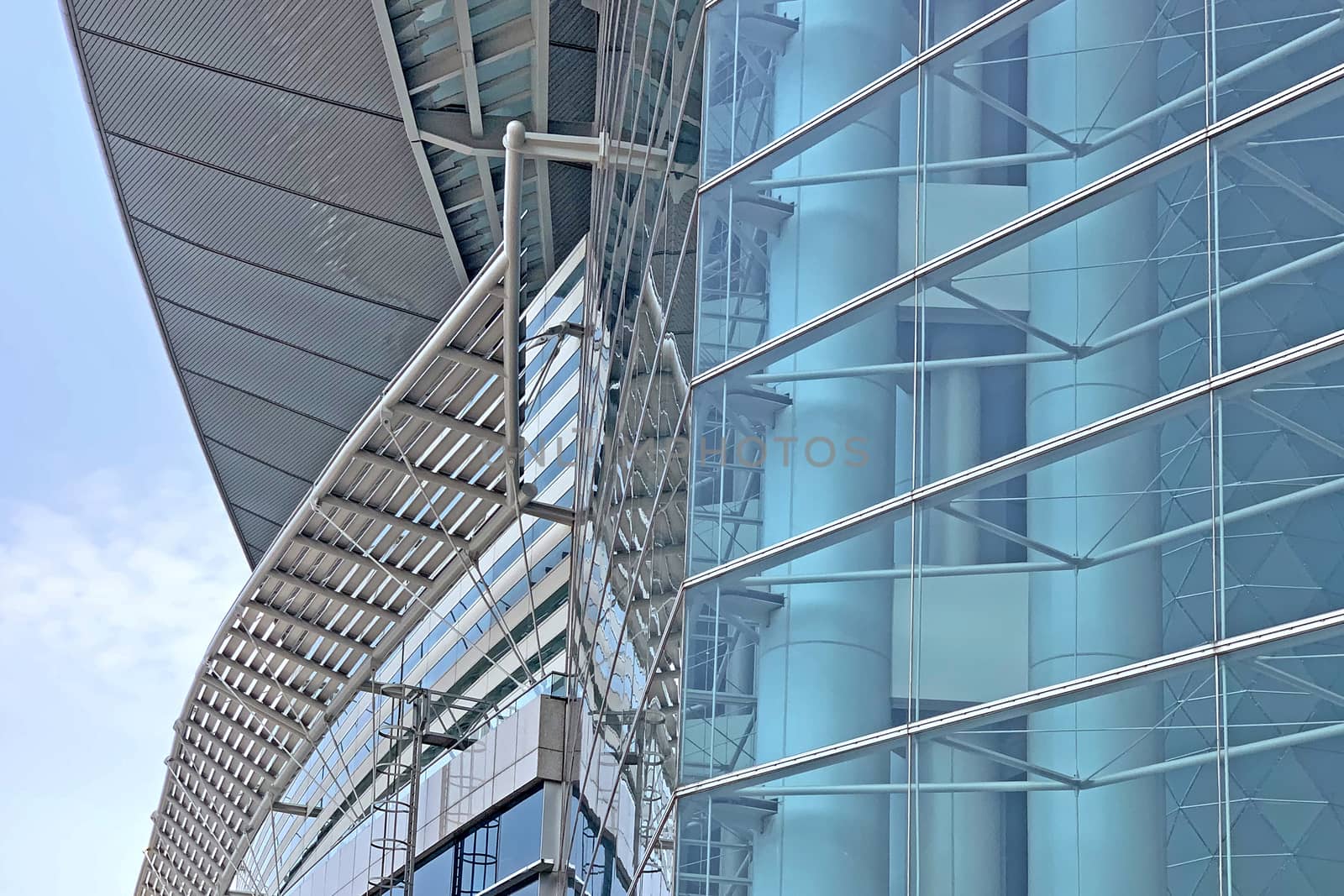 The exterior  glass window of modern exhibition center building in Hong Kong city