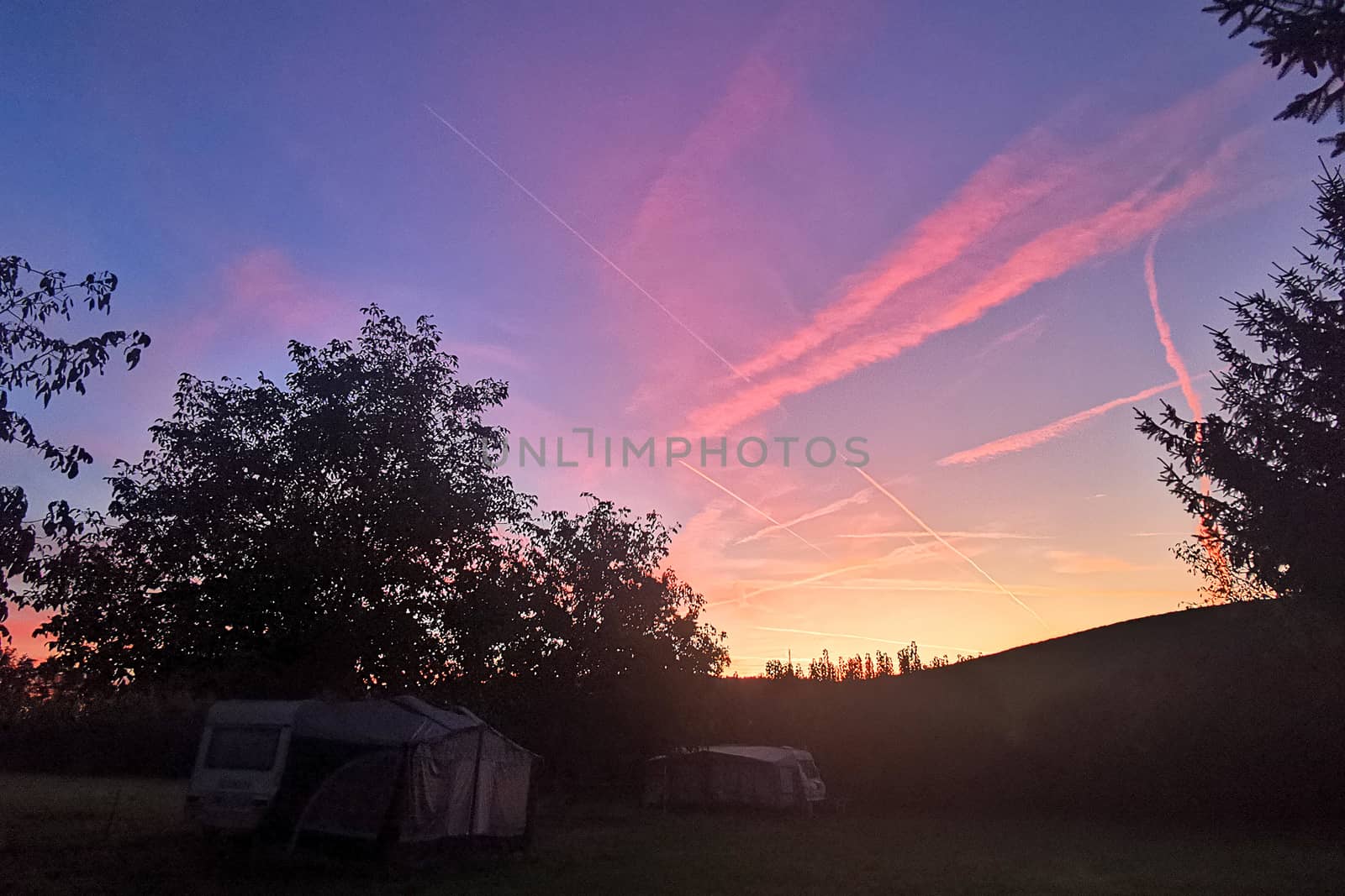 Outdoor camping tent, park in Switzerland countryside campsite by cougarsan