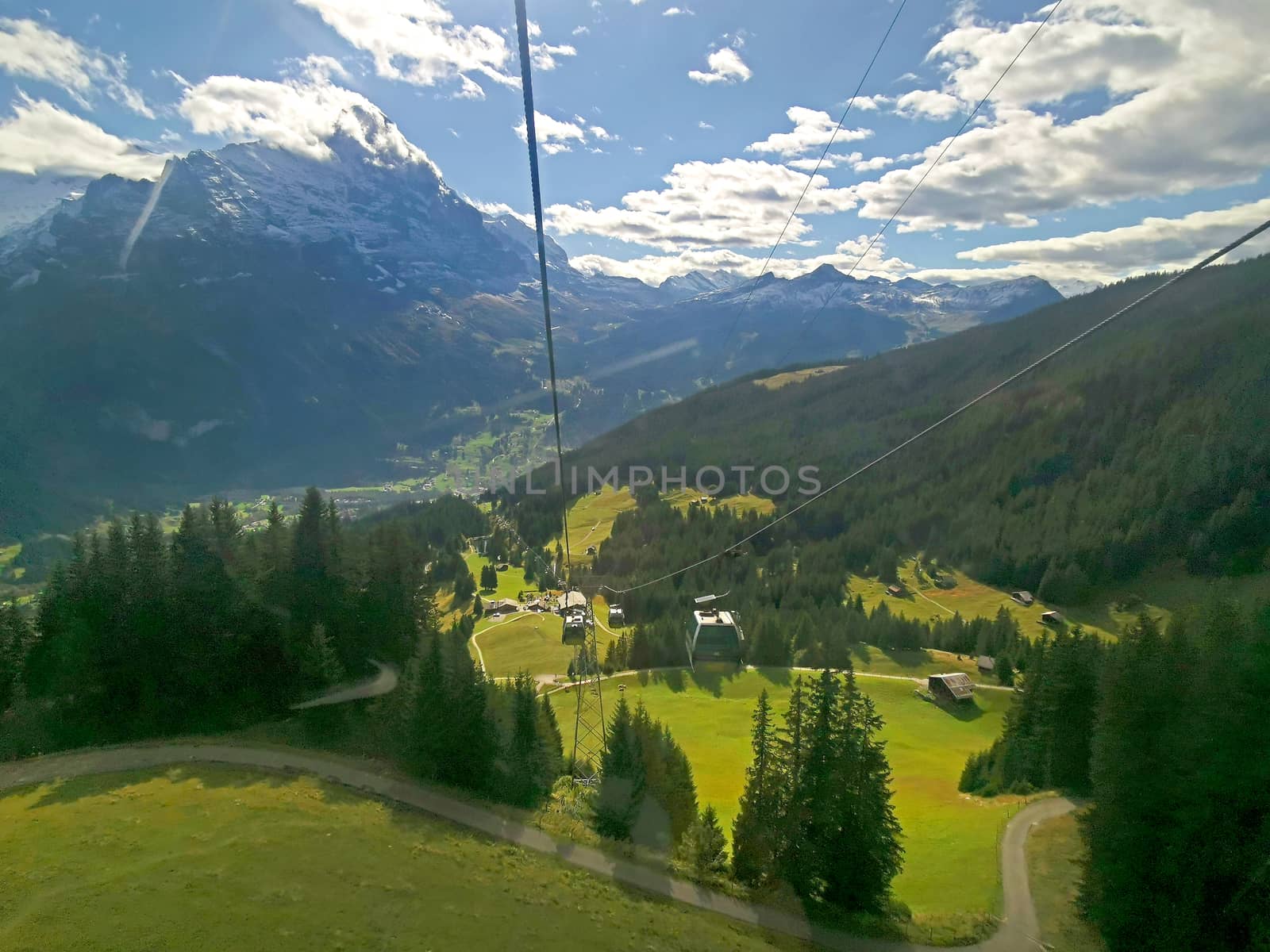 The Switzerland Grindelawld snow mountain with sightseeing cable car and small town