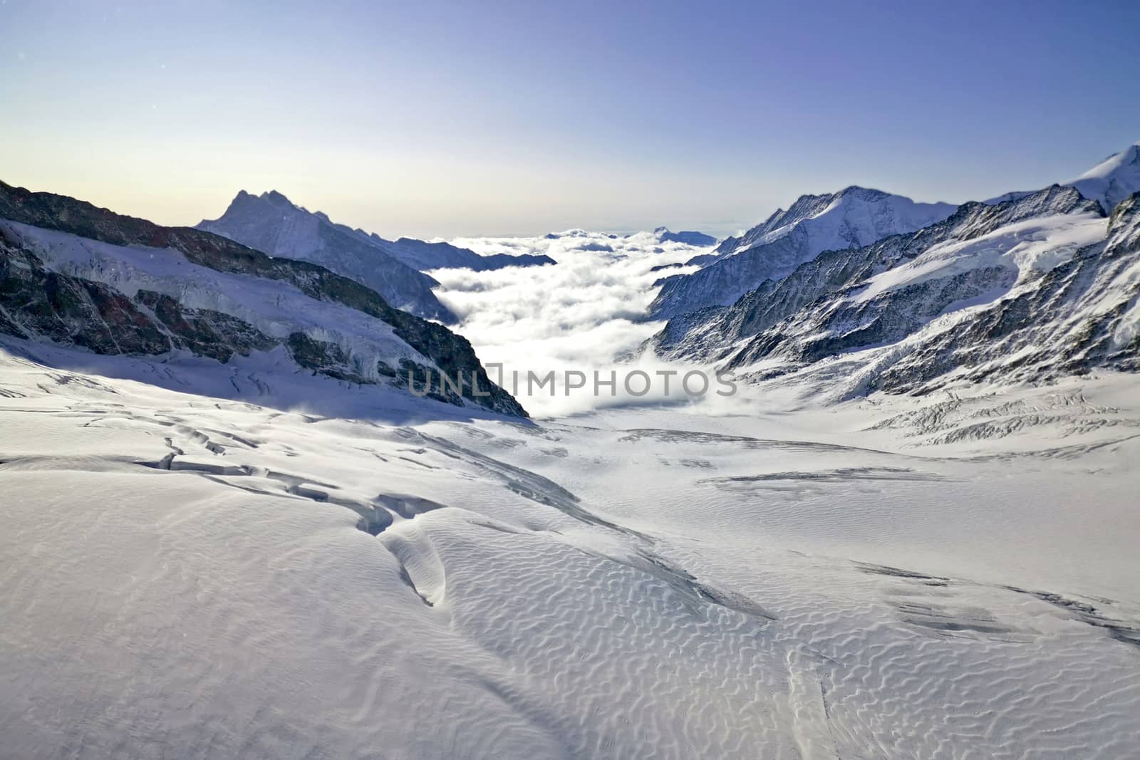 The peak and sea of clouds in Switzerland Grindelawld snow mountain 