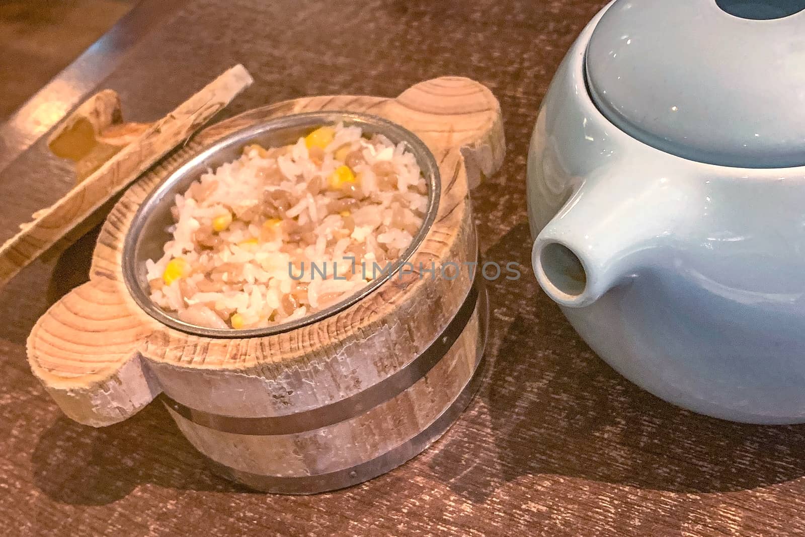 Chinese beef rice with traditional bowl and white teapot by cougarsan