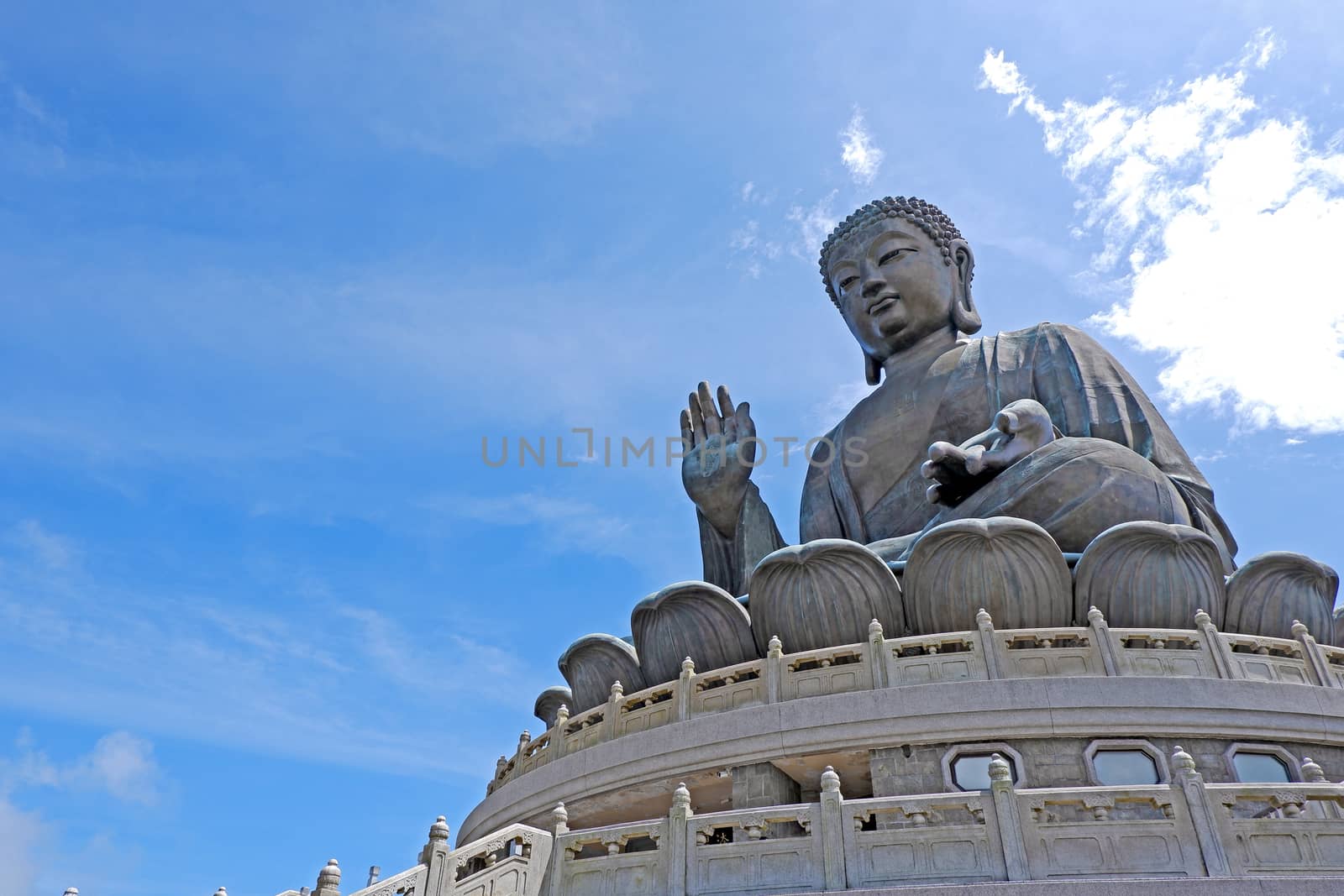 The large outdoor bronze statue of  seated Tian Tan Buddha in Hong Kong