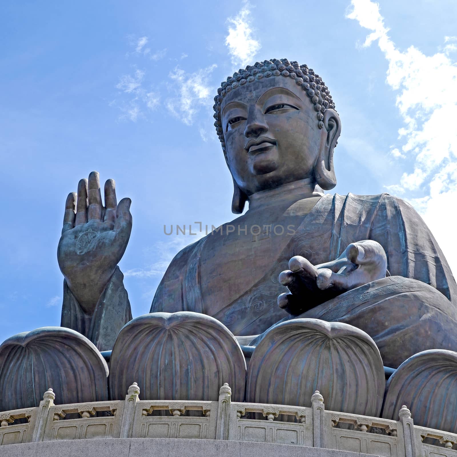 The large outdoor bronze statue of  seated Tian Tan Buddha in Hong Kong