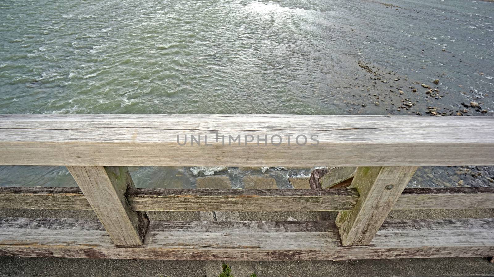 The wooden bridge, rapid river in countryside of Japan Kyoto