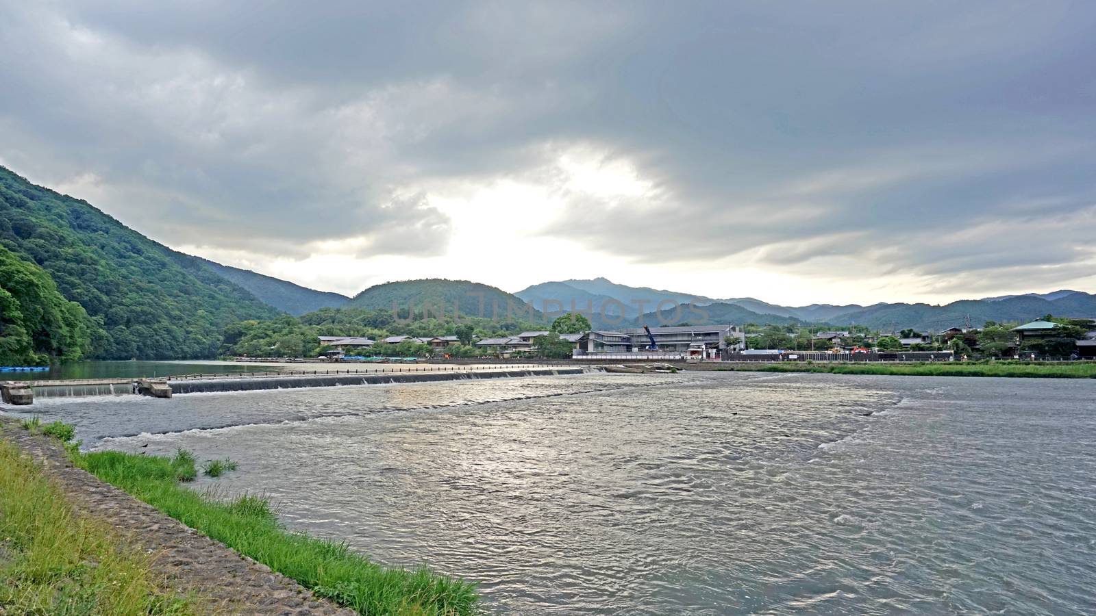 Stone footpath, rapid river in countryside of Japan Kyoto by cougarsan