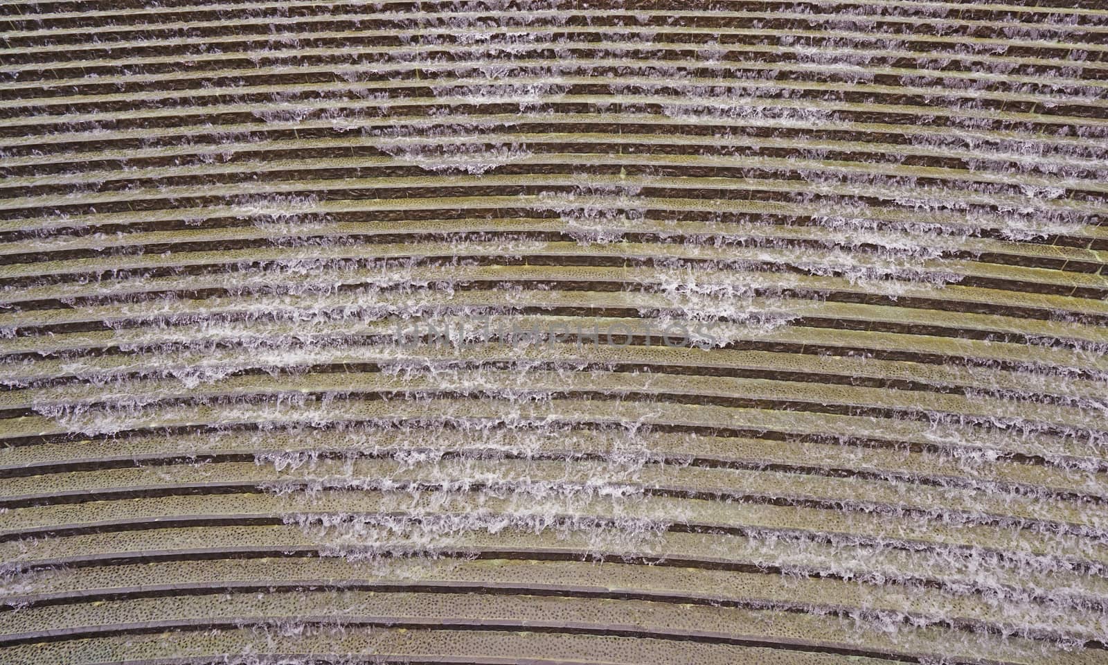 The outdoor waterfall staircase decoration background in the park