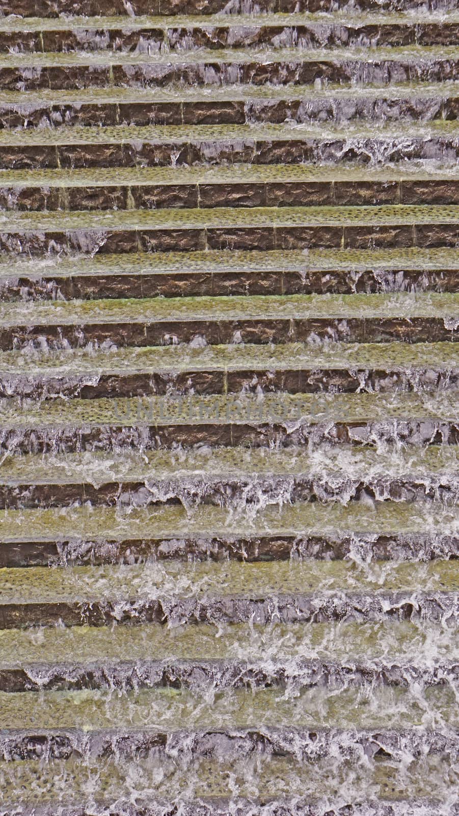 The vertical outdoor waterfall staircase decoration background in the park