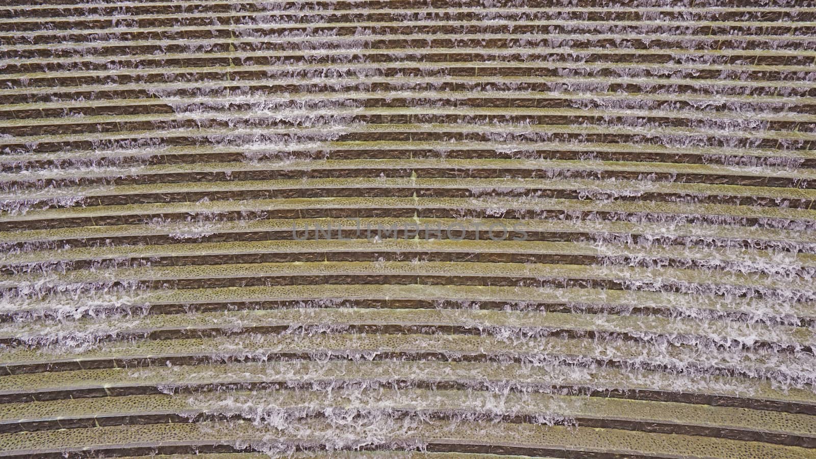 The outdoor waterfall staircase decoration background in the park