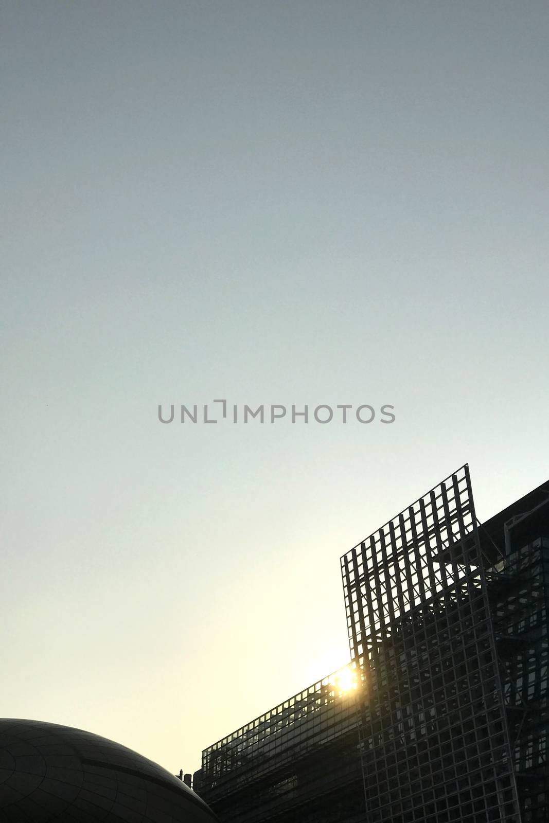 modern commercial office building, sunlight and the blue sky